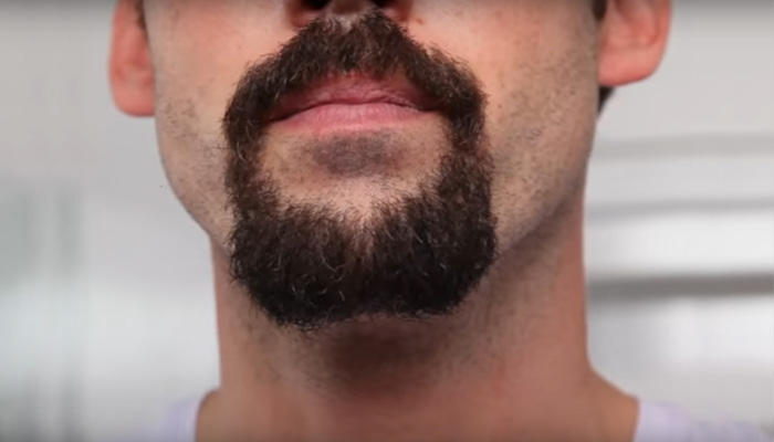 Man&rsquo;s face with a goatee beard style